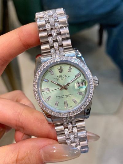 Rolex Datejust 31mm Baguette Diamond Bezel 316L Steel Mint Green Face Lady Watch